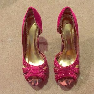 Open-toe stiletto heels.